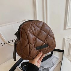 Winter Travel Brown Shoulder Bag, Brown Leather Bags For Winter, Winter Leather Shoulder Bag, Leather Shoulder Bag For Winter, Trendy Quilted Bags For Fall, Brown Quilted Leather Bag, Brown Quilted Leather Shoulder Bag, Quilted Leather Shoulder Bag For Daily Use, Daily Use Quilted Leather Shoulder Bag