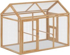 a small wooden chicken coop with two doors