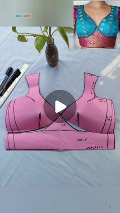 a woman's bra is cut out and placed on a table