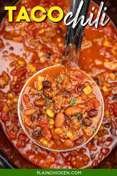 a spoon full of taco chili in a crock pot with the title above it