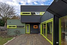 a house that has been painted green and black