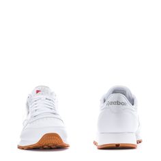 This Reebok Classic Leather with the gum sole is the most stylish and timeless sneaker to hit shelves. Featuring lightweight cushioning and a low-cut design, this casual men's sneaker is perfect for all-day wearing and versatile styling. Dress this sneaker up in slacks or dress them down with sweatpants and a fitted tee. Soft leather upper. Removable sockliner accommodates orthotics. Die-cut EVA midsole for lightweight cushioning. High abrasion rubber gum outsole for durability. Imported. Reebok Classic Leather, Shoes For Kids, Reebok Classic, At School, Classic Leather, Out Of Style, Workout Tee, Mens Bottom, White Sneaker