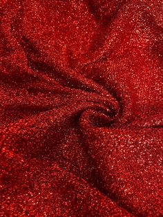 red glitter fabric textured up close to the camera