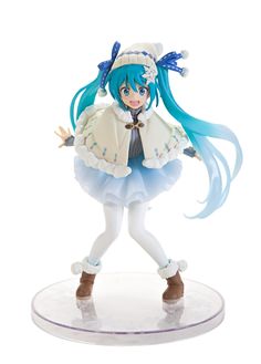 a figurine with blue hair and white clothes