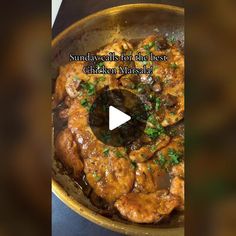 the video shows how to cook chicken with mushrooms and parsleys in a skillet