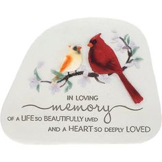 a memorial ornament with two birds sitting on a branch and the words in loving memory