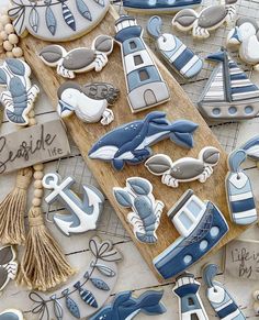 blue and white decorated cookies on a table