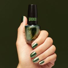 OPI Nail Lacquer - Wicked Collection - Ozitively Elphaba / 0.5 oz.. Unlock your clients’ inner magic with the stunning Ozitively Elphaba, a bold green shade infused with gold pearlescence. This luxurious polish from OPI’s limited-edition Wicked Collection brings an enchanting touch to any manicure, perfect for the holiday season or whenever your clients want to make a statement. With its vibrant color and transformative effects, this polish is a true game-changer in the world of professional nai Opi Wicked 2024, Nail Primer, Red Carpet Manicure, Green Nail Polish, Glitter Nail Polish, Opi Nail Lacquer, Opi Nail Polish, Gel Lacquer, Nail Polish Sets