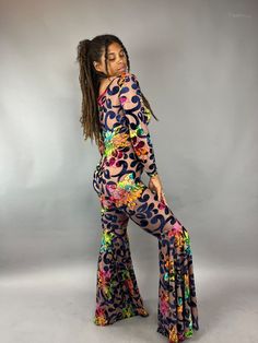 About this item Step into the comfort and glam with our stunning floral print Disco Jumpsuit!This Custom Bell Bottom Catsuit is the perfect choice for your next elegant party or festival outing. Each piece is meticulously crafted to measure, ensuring a flawless fit that's tailored just for you.Featuring luxurious crush velvet slightly see trough , this Glamorous Catsuit exudes royalty and sophistication.The bell bottom pants and long sleeves with a boat neck a captivating silhouette that's bound Spring Fitted Floor-length Jumpsuits And Rompers, Full Length Spring Party Jumpsuits And Rompers, Fitted Multicolor Evening Sets, Fitted Multicolor Sequin Sets, Floor-length Party Bottoms For Spring, Bohemian Jumpsuits And Rompers For Spring Party, Bohemian Maxi Length Jumpsuits And Rompers For Party, Bohemian Party Sets For Spring, Floor-length Bottoms For Summer Party