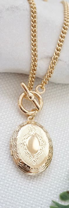 Oval Locket Necklace Gold Toggle Necklace With Locket Pendant Locket Jewelry for Photo or Secret Message Meaningful Gift for Mom or Grandma - Etsy Dainty Oval Pendant Locket Necklace For Anniversary, Vintage Gold Locket Necklace With Lobster Clasp, Vintage Oval Link Jewelry With Charms, Elegant Charm Necklace With Lobster Clasp And Medallion, Antique Oval Necklaces With Charms, Elegant Medallion Charm Necklace With Lobster Clasp, Round Locket Necklace With Charms For Anniversary, Vintage Charm Oval Link Necklace As Gift, Elegant Gold Locket Necklace With Lobster Clasp