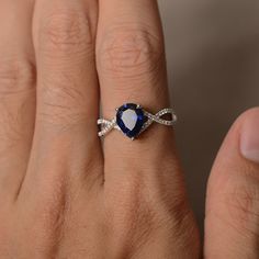 This is a gorgeous handmade creation. Its beauty is its simplicity & Elegance. The 7*9 mm pear shape faceted lab sapphire is crafted in solid sterling silver and with rhodium plated. All item is sent in a beautiful gift box If you have any idea of design your ring,pls contact me directly. You can realize more lovely stuff clicking the link https://www.etsy.com/shop/knightjewelry?refshopsection_shophome_leftnav Please leave the correct address and you phone number for delivering successfully. Fine Jewelry Pear-shaped Sapphire Ring, Trillion Cut Sapphire Ring Gift, Pear-shaped Sapphire Ring, Fine Jewelry Sapphire Ring With Pear Shape, Pear-shaped Sapphire Gemstone Rings, Pear-shaped Sapphire Ring With Center Stone, Teardrop Sapphire Ring Fine Jewelry Gift, Fine Jewelry Teardrop Sapphire Ring Gift, Teardrop Sapphire Ring With Accent Stones For Wedding