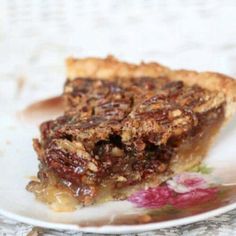 a piece of pie sitting on top of a white plate