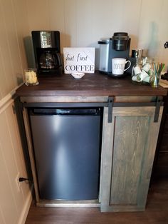 a small kitchen with a coffee maker on the counter