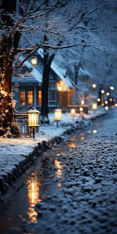 a snowy street with some lights on it