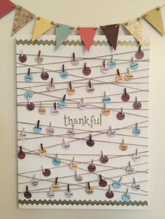 a bulletin board with clothes pins attached to it that says, thank you for thanksgiving