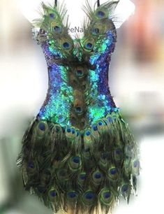 a mannequin with peacock feathers on it