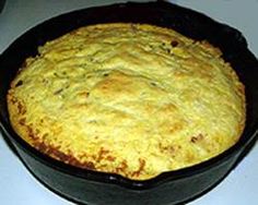 a close up of a pie in a pan on a stove top with a white background