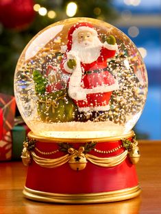 a snow globe with santa clause on it