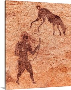 an animal and man are depicted in this rock painting