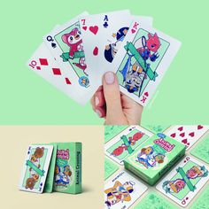 four playing cards with the same character on them, and one being held up by someone's hand