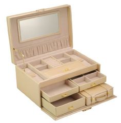 an open beige leather jewelry box with three drawers