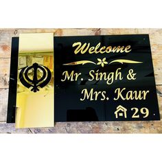 a welcome sign for mr and mrs kaur