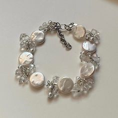 "✿ Made with glass beads, freshwater pearls, and metal accents ✿ Clear and milky white ✿ 7.5\" plus 1.5\" of extension chain" Gothic Bracelet, Strawberry Flower, Butterfly Bracelet, Strawberry Milk, Metal Accents, Milky White, Flower Bracelet, Photo Bracelet, Phone Charm