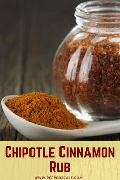 a spoon full of cinnamon spice next to a glass jar filled with cinnamon rubs