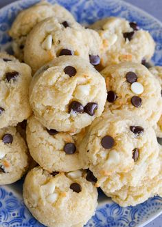 a blue and white plate filled with cookies