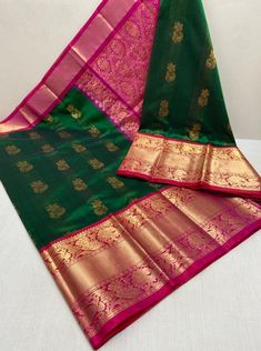 green and pink banaram saree with gold border on the palan silk