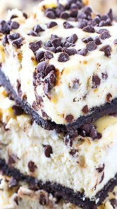 three chocolate chip ice cream squares stacked on top of each other with oreo chips