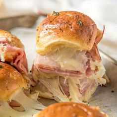 ham and cheese sliders with dipping sauce on the side