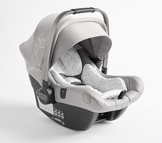 an infant car seat with the baby in it