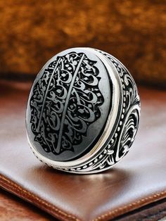 ARBIC ISLAMIC Hematite Hadid engraved Quranic 14 Infallibles Silver Men Ring , Gemstone Ring, Vintage Style Gift for Him 14 Infallibles:     Prophet Muhammad Ar-Rasool (PBUH&HF)     Imam Ali Al-Ameeril Mo'mineen (AS)     Hazrat Fatima Az-Zahra (AS)     Imam Hasan Al-Mujtaba (AS)     Imam Husain As-Shaheed (AS)     Imam Zain-ul-Abideeen (AS)     Imam Muhammad Al-Baqir (AS)     Imam Ja'far As-Saadiq (AS)     Imam Musa Al-Kazim (AS)     Imam Ali Ar-Reza (AS)     Imam Muhammad At-Taqi (AS)     Imam Black Engraved Round Ring, Traditional Black Engraved Handmade Ring, Traditional Black Handmade Engraved Ring, Black Engraved Ring With Intricate Design, Black Etched Rings As A Gift, Black Spiritual Engraved Ring, Egyptian Rings Men, Afghan Rings Men, Iranian Rings For Men