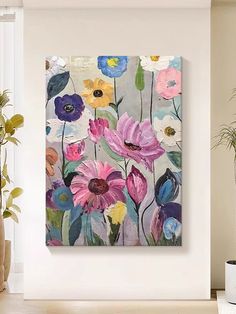 an abstract floral painting on a white wall