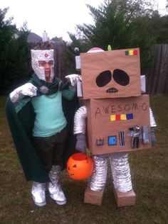 two people in costumes standing next to each other