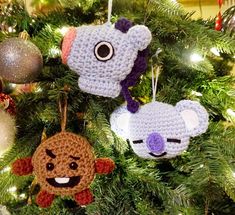 three crocheted ornaments hanging from a christmas tree