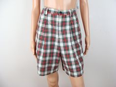 Vintage GAP plaid trouser shorts from the late 80s / early 90s.  Feature a 1.5" fitted waistband with 3 belt loops, a button and 6" fly front zipper closure.  Features a high waisted silhouette with just above the knee length legs.  Has pleats in front, diagonal front side pockets and one back welt pocket with button closure.  Made of a woven cotton material with tartan plaid designs in shades of off white, red, navy blue, green, yellow and black.  Perfect transitional piece to wear going into fall and would also be great for the holiday season worn over tights.  Freshly laundered and ready to wear. Label: "GAP".  Made in Hong Kong. Fiber Content: 100% Cotton. Stamped Size: 5/6.  Please see the measurements listed at the end of the description to ensure a proper fit. Condition: In great vi Cheap Plaid Shorts, Trouser Shorts, Plaid Trousers, Preppy Fall, Scottish Plaid, Plaid Design, Tartan Plaid, Scotch, Cotton Shorts