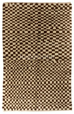 a brown and white checkered area rug