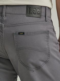 For an unparalleled experience in comfort, nothing beats Lee® Extreme Motion styles. The Extreme Motion MVP five-pocket twill pants offer a classic, versatile look that's easy to wear to the office or for a casual weekend spent relaxing. The pants feature a stain-repelling fabric, Extreme Flex waistband, and thermal regulation and moisture-wicking properties for maximum comfort that lasts all day.The men's twill pants offer a timeless straight fit and tapered leg opening you can pair with boots, sneakers, or dress shoes. Grab a pair in every color for a daily uniform you can always count on. Daily Uniform, Mens Pants Fashion, Twill Pants, Casual Weekend, Boots Sneakers, Pants Men, Every Color, Men's Pants, Moisture Wicking