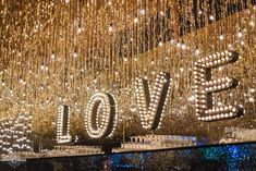 the words love spelled out in lights