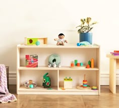 a wooden toy shelf with toys on it