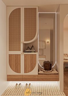 the interior of a modern bathroom with wooden cabinets and white walls, along with an oval mirror on the wall