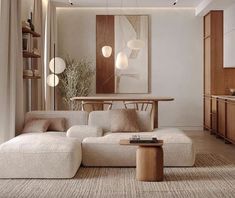 a living room filled with lots of furniture next to a table and bookshelf