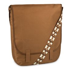 a brown cross body bag with checkered straps