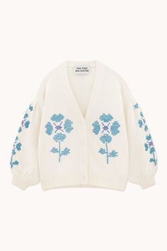 Introducing our Luisa Embroidered Cardigan, crafted with pure cotton knit in a classic off-white color. This cardigan showcases intricate floral embroidery that adds a touch of elegance to any outfit. With its lightweight and breathable fabric, it's perfect for layering during transitional seasons. Whether it's a casual day out or a special occasion, this cardigan is a versatile piece that effortlessly elevates your outfit.Made in China.This model is 176cm tall and wearing a size 36. Cardigan Embroidery, Outfit Check, Embroidered Cardigan, Baby Style, Tiny Cottons, Clothing Design, White Cardigan, Guilty Pleasures, Striped Cardigan