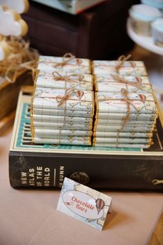 a stack of books sitting on top of a table