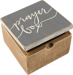 a wooden box with writing on it