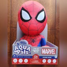 the spider - man plush toy is in its box