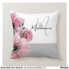 a pillow with pink flowers on it and the word makkama written in cursive writing